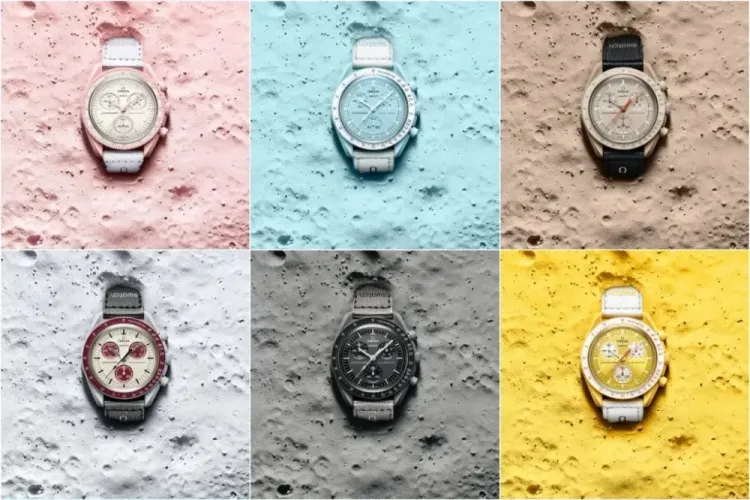 Six MoonSwatches in various colours lined up